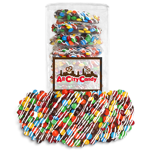 Milk Chocolate M&M Hand Dipped Premium Pretzel Twists 10 pc. Tube - Visit www.allcitycandy.com for great candy, service and delicious treats.