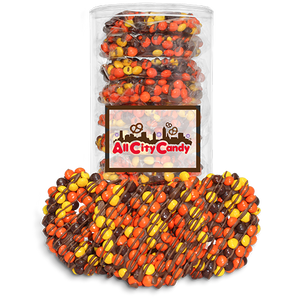 Milk Chocolate Hand Dipped Premium Reese's Pieces® Pretzel Twists 10 pc. Tube - Visit www.allcitycandy.com for great candy, service and delicious treats.