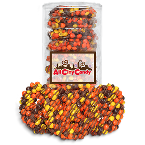 Milk Chocolate Hand Dipped Premium Reese's Pieces® Pretzel Twists 10 pc. Tube - Visit www.allcitycandy.com for great candy, service and delicious treats.