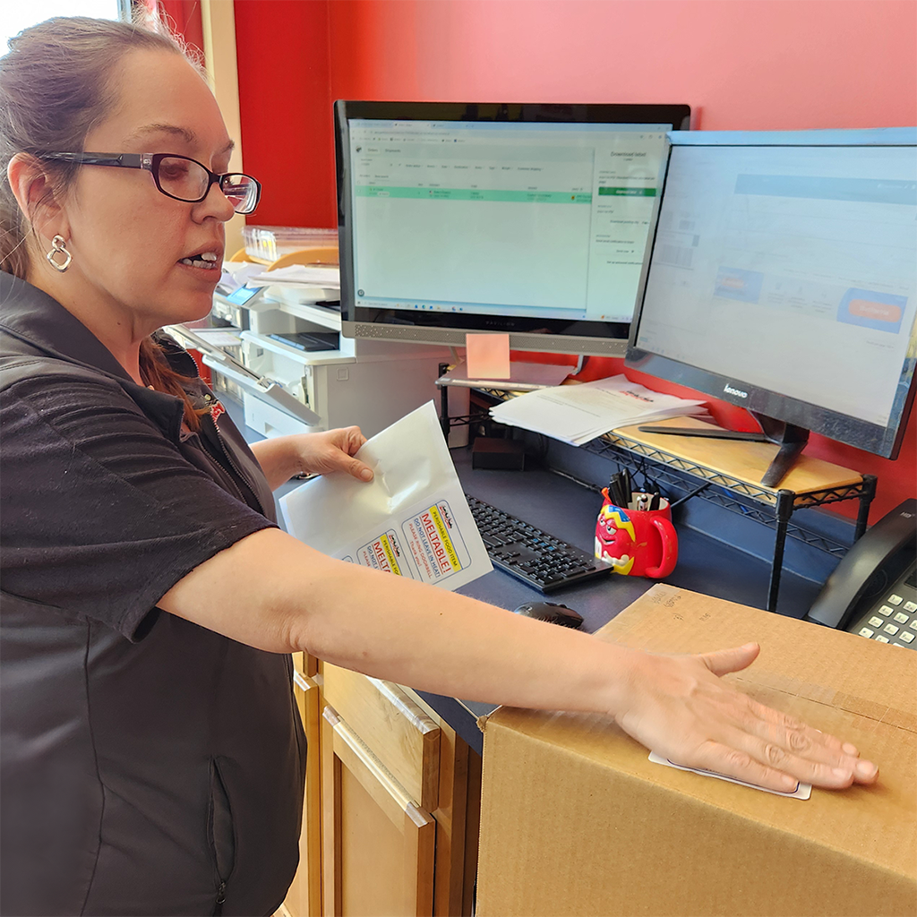 All City Candy team member coordinating a corporate gift order