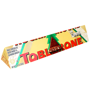 Toblerone Christmas Milk Chocolate 12.6 oz. Box - Visit www.allcitycandy.com for great candy, service and delicious treats! 