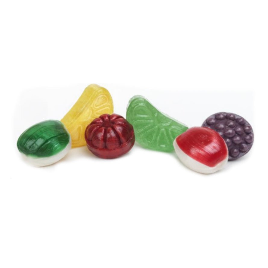 Colorful fruit-shaped candies on a white background